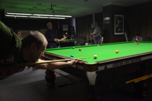 Przy stole: Robert Kosielski